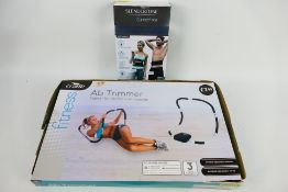 Slendertone - Ab Trimmer. Two boxed items appearing in excellent / as new condition.