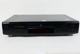 Sony - CD separate. An unboxed Sony CDP-XE220. Unit powers on and is backlit.
