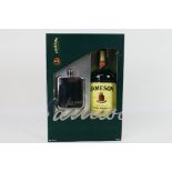 A Jameson Irish Whiskey gift set comprising a 1 litre bottle of Jameson Triple Distilled and a hip