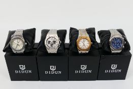Four boxed Didun Design gentleman's wrist watches. [4].