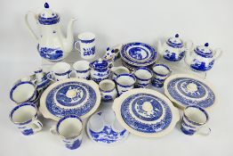 A quantity of blue and white dinner and tea wares, predominantly Wade Willow pattern for Ringtons.