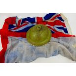 A World War Two (WW2 / WWII) Brodie helmet, dated 1939 and a white ensign,