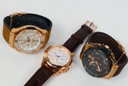 Three wrist watches by Megir.