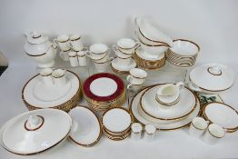 A quantity of dinner and tea wares by Royal Doulton for St Michael in the Connaught pattern,