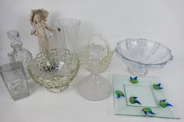 A quantity of glassware to include decanters, bowls vases and other.