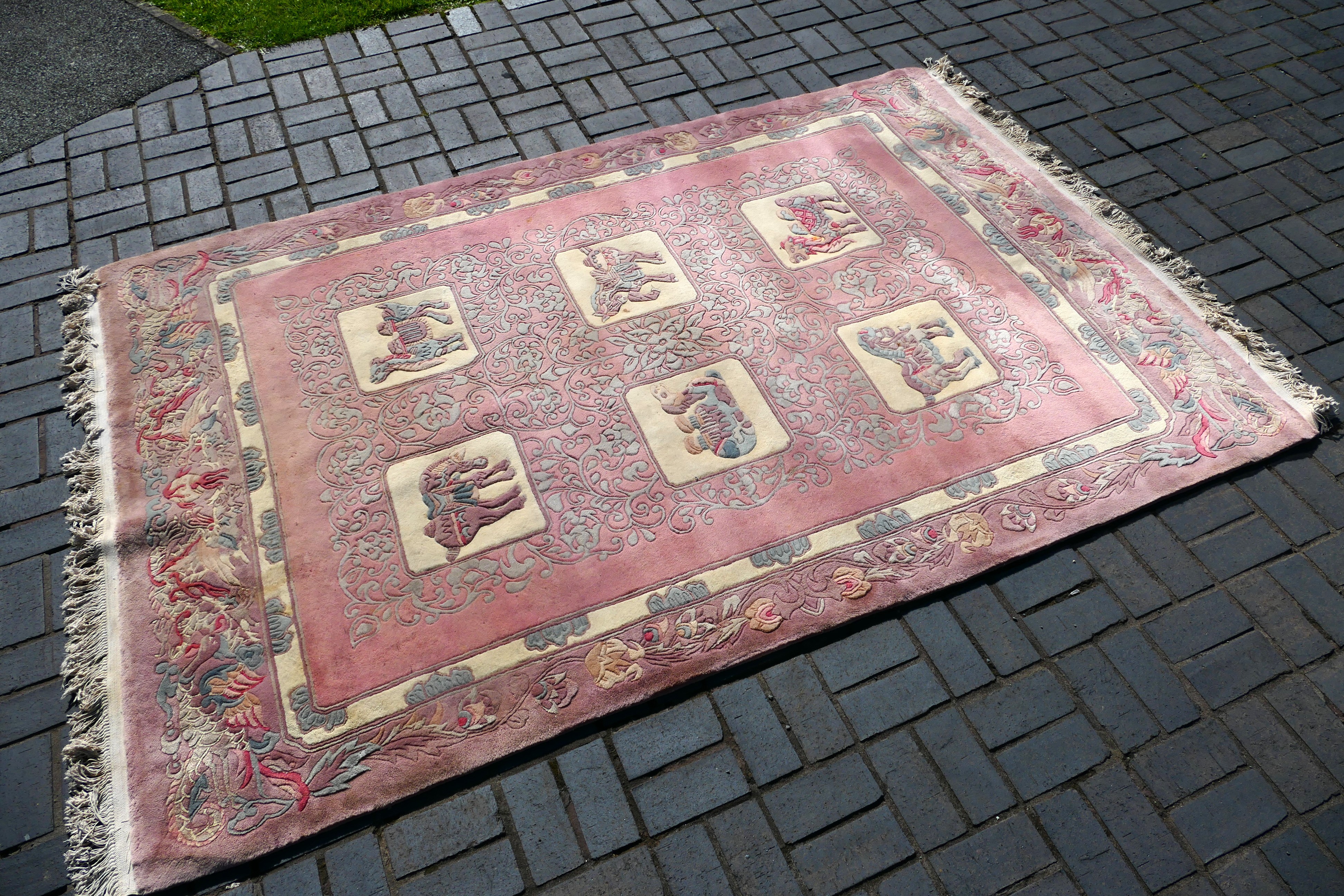 A large rug with animal decoration to include elephant, camel and other, - Image 2 of 7