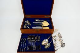A canteen of plated and stainless cutlery, part filled, and eight Georgian silver coffee spoons,