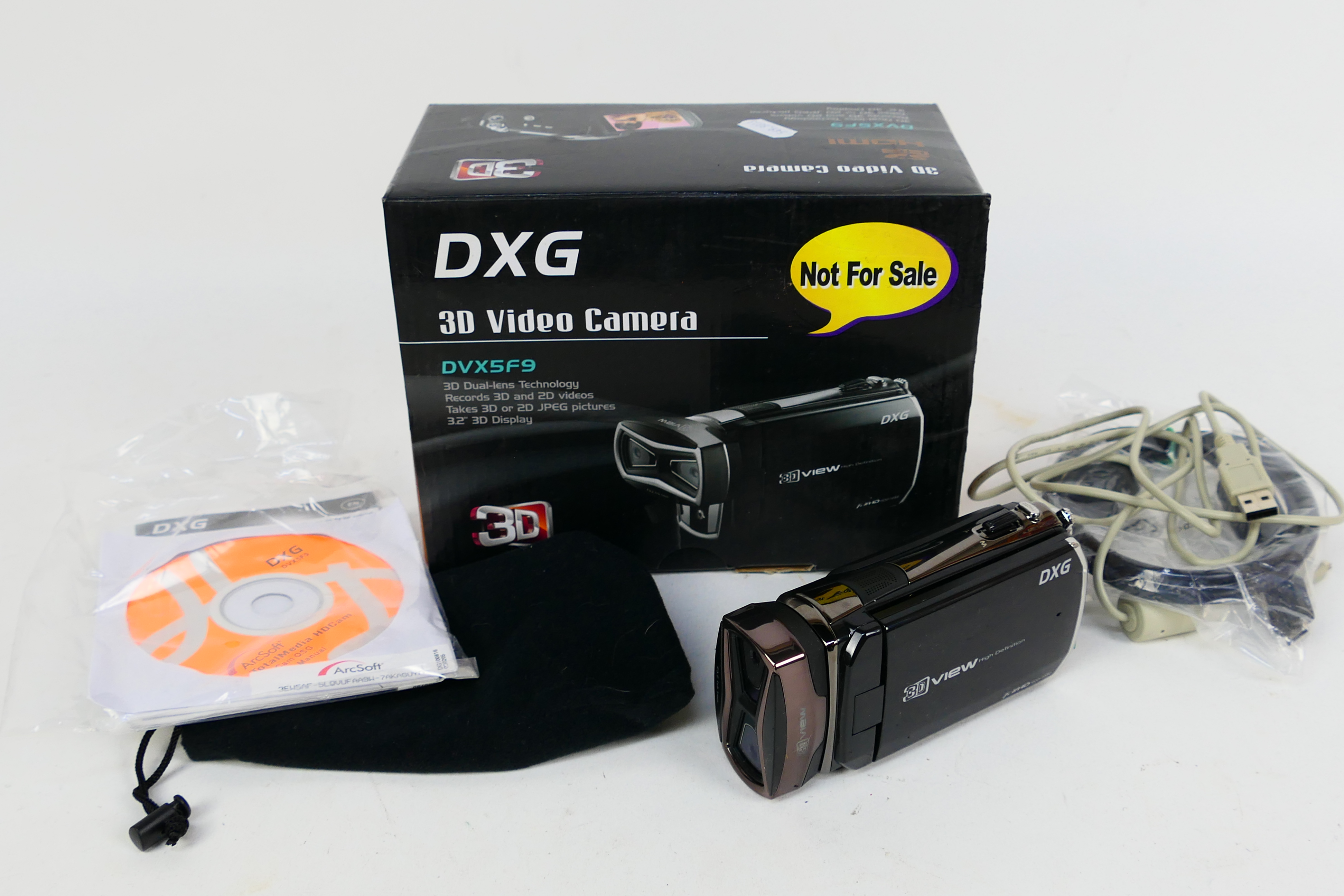 A boxed DXG 3D Video Camera, appears unused.