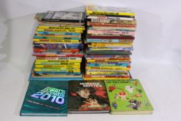 Two boxes of children's annuals and comics to include, Classics Illustrated, Yang, Wonder Woman,