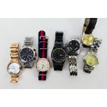 A quantity of wrist watches to include Ouyawei, Goer, Festina, Ricoh and other.