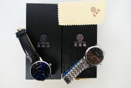 Two boxed Starking automatic wrist watches. [2].