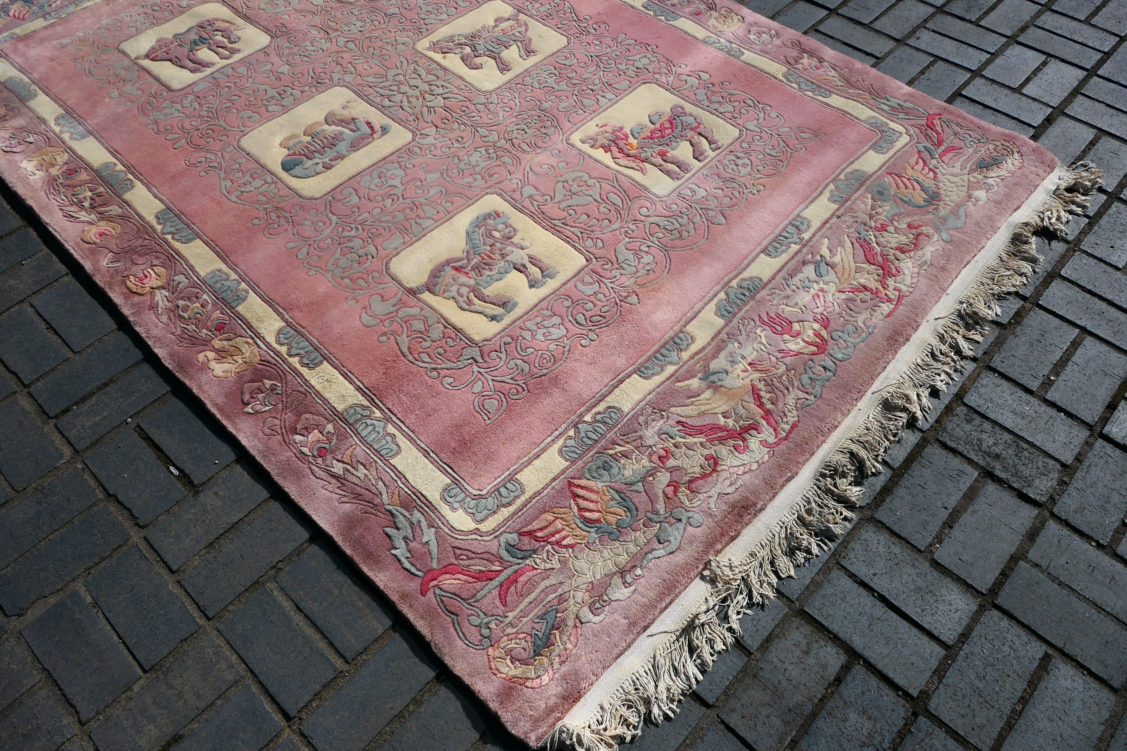 A large rug with animal decoration to include elephant, camel and other, - Image 5 of 7