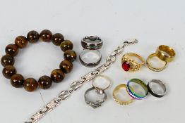 A small collection of costume jewellery, rings and bracelets, some pieces stamped 925 / Silver.