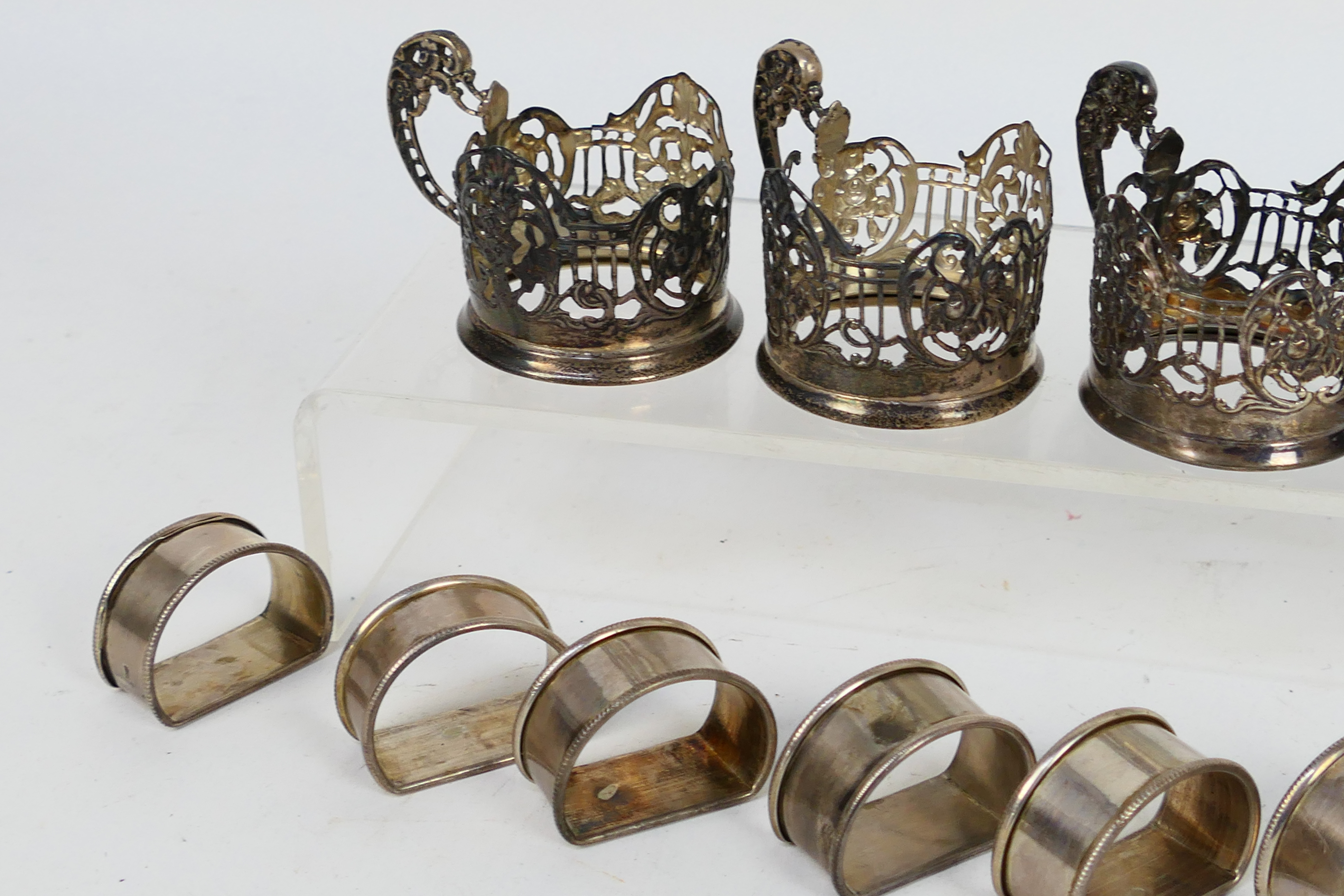 Four Edwardian silver coffee can holders with scrolling floral decoration, - Image 2 of 4