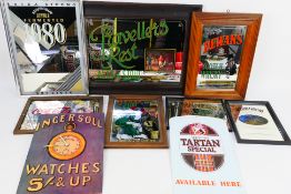 A group of advertising pieces, mirrors and signs to include Coca Cola, Strongbow,