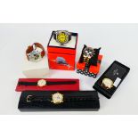 A collection of wrist watches to include Stauer, Rotary, Roamer and other, some in original boxes.