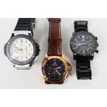 Three gentleman's wrist watches by Megir.
