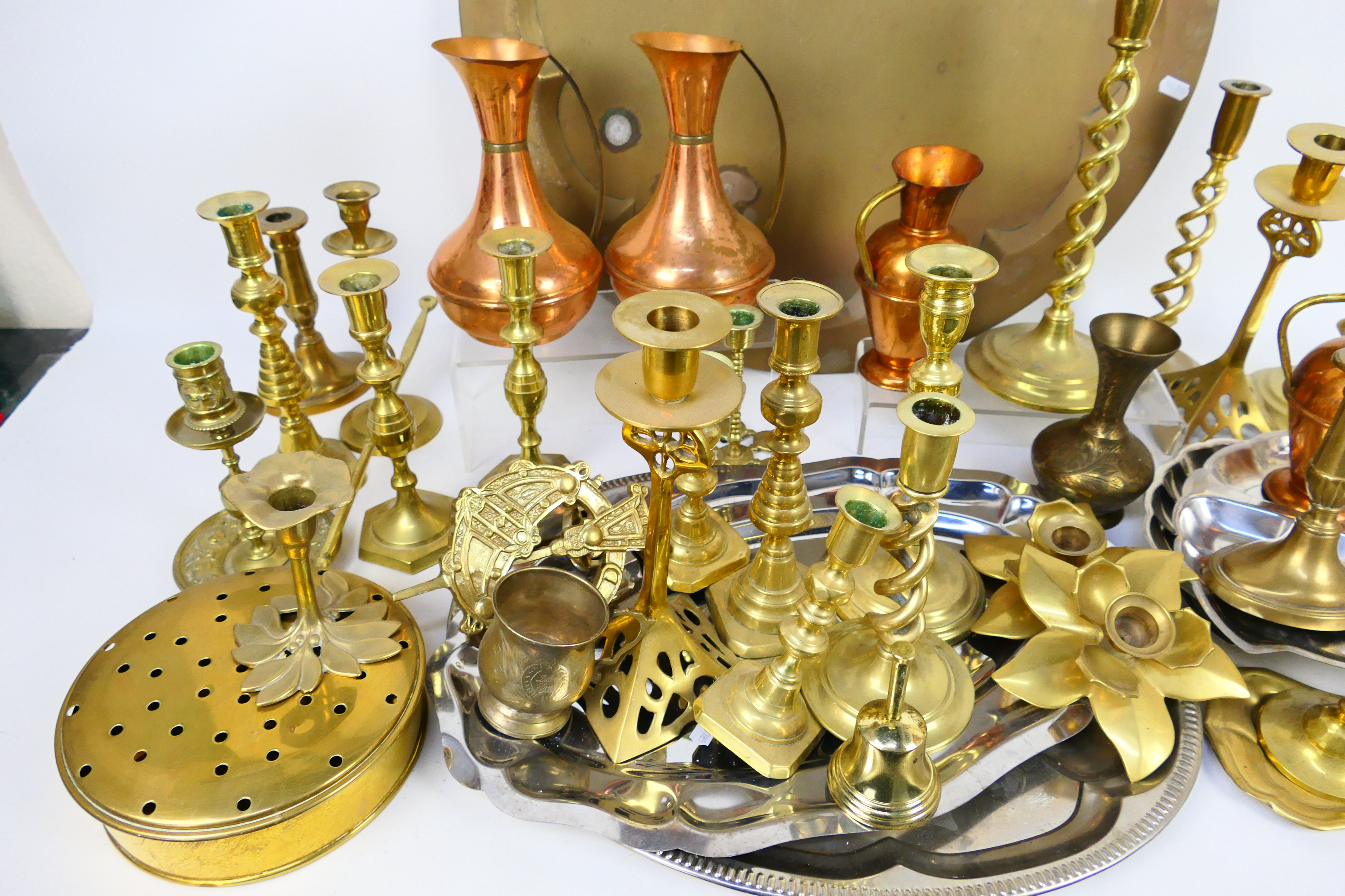 Mixed metal ware, predominantly copper and brass to include candlesticks, trays, jugs and other. - Image 2 of 4