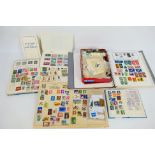 Philately - A collection of UK and foreign stamps, loose and housed in albums.