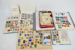 Philately - A collection of UK and foreign stamps, loose and housed in albums.