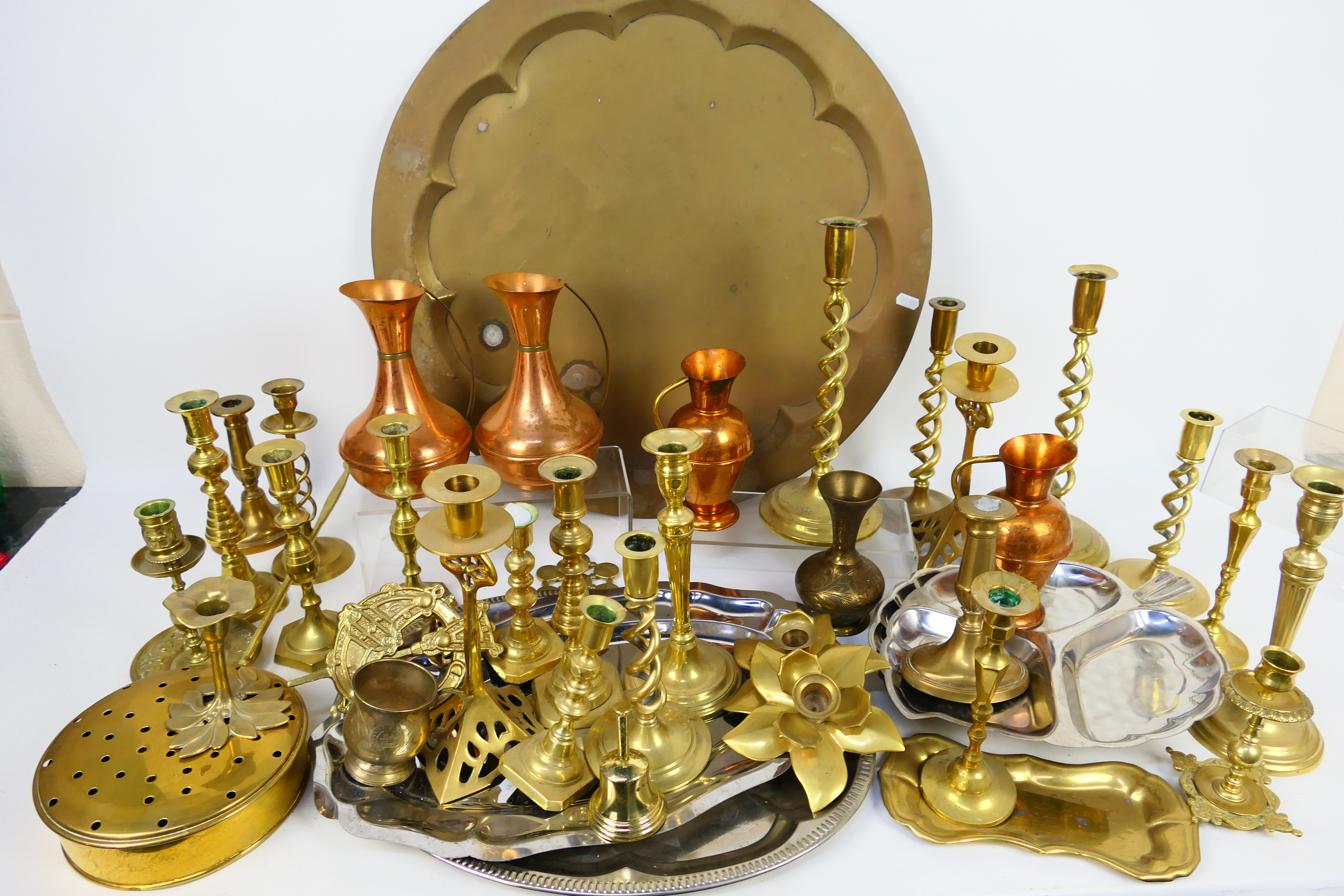 Mixed metal ware, predominantly copper and brass to include candlesticks, trays, jugs and other.