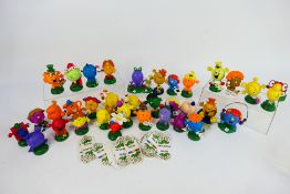 A large collection of Mr Men and Little Miss figures.
