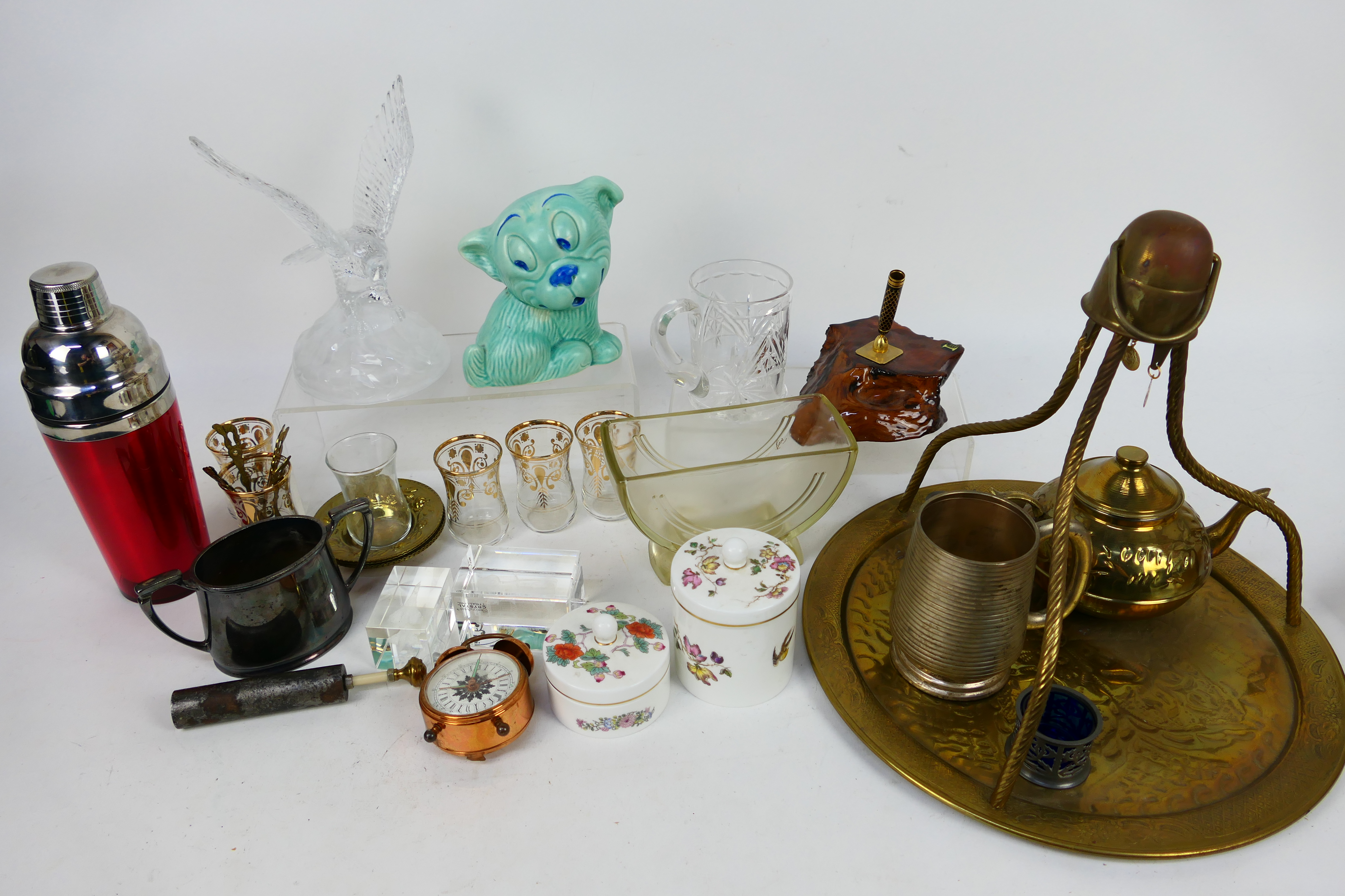 A mixed lot to include brassware, ceramics, glassware and other.