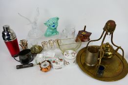 A mixed lot to include brassware, ceramics, glassware and other.