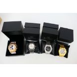 Four boxed Didun Design gentleman's wrist watches, two boxes original.