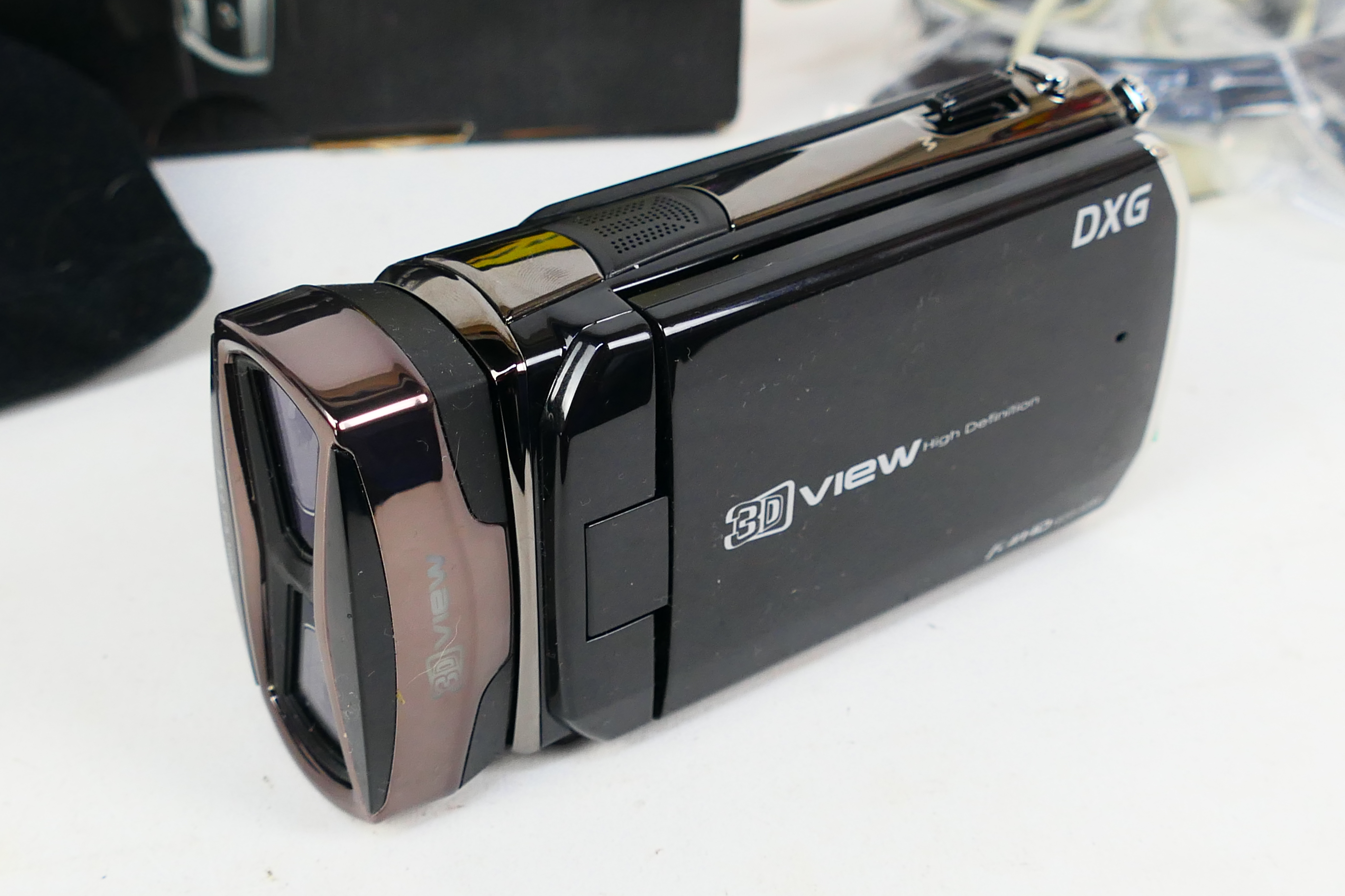A boxed DXG 3D Video Camera, appears unused. - Image 2 of 4
