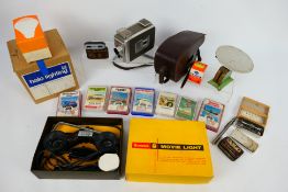Lot comprising a Kodak Brownie 8mm Movie Camera II, a boxed Brownie 8 Movie Light,