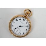 A gold plated open face pocket watch, Arabic numeral hour markers to a white enamel dial,