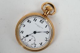 A gold plated open face pocket watch, Arabic numeral hour markers to a white enamel dial,