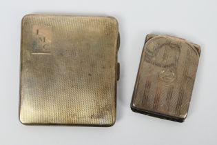 A silver cigarette case with engine turned decoration, Birmingham assay 1939 and a silver card case,