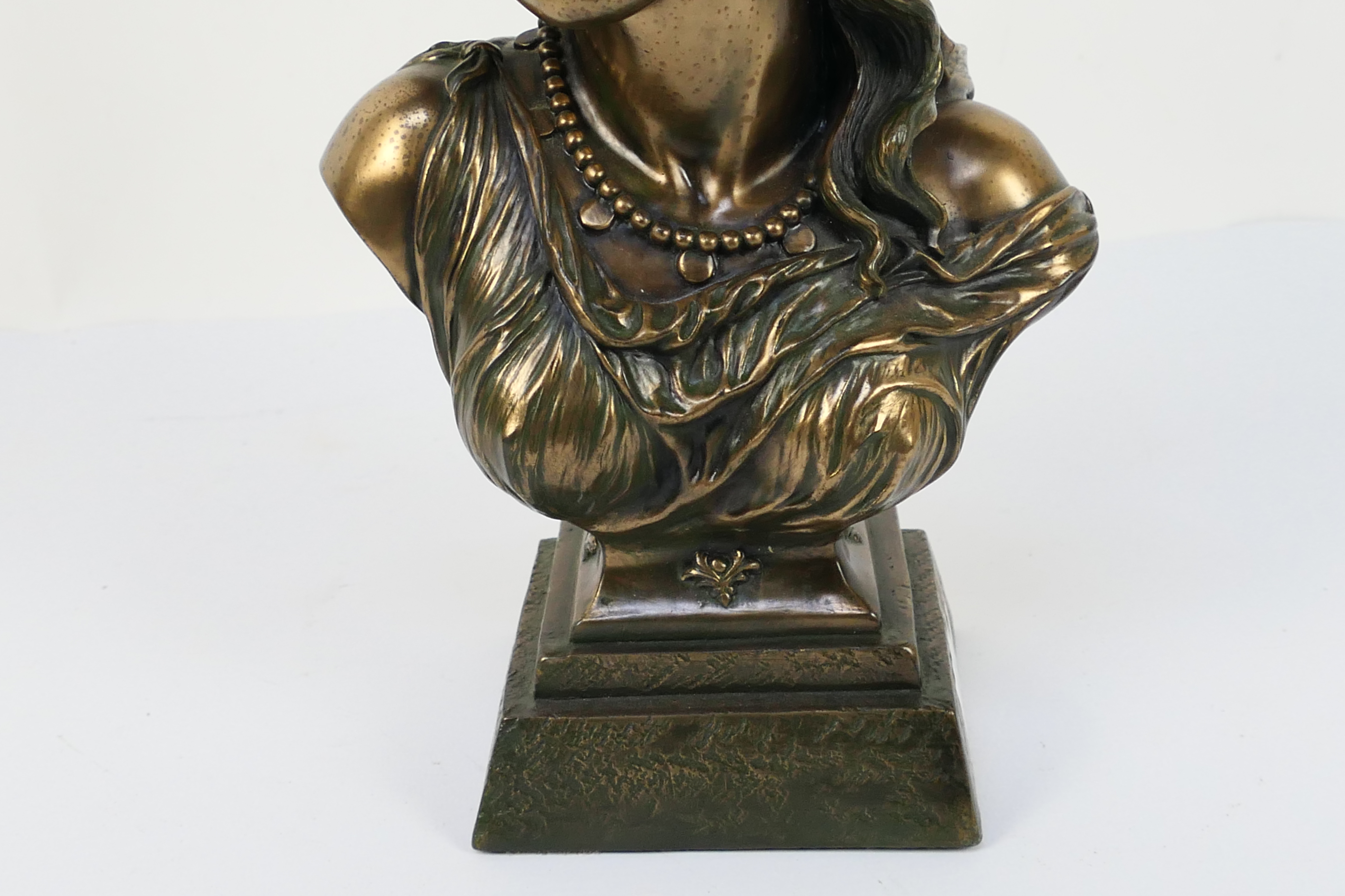 A bronzed bust depicting a female, signed Crosa 2001, approximately 32 cm (h). - Image 3 of 6