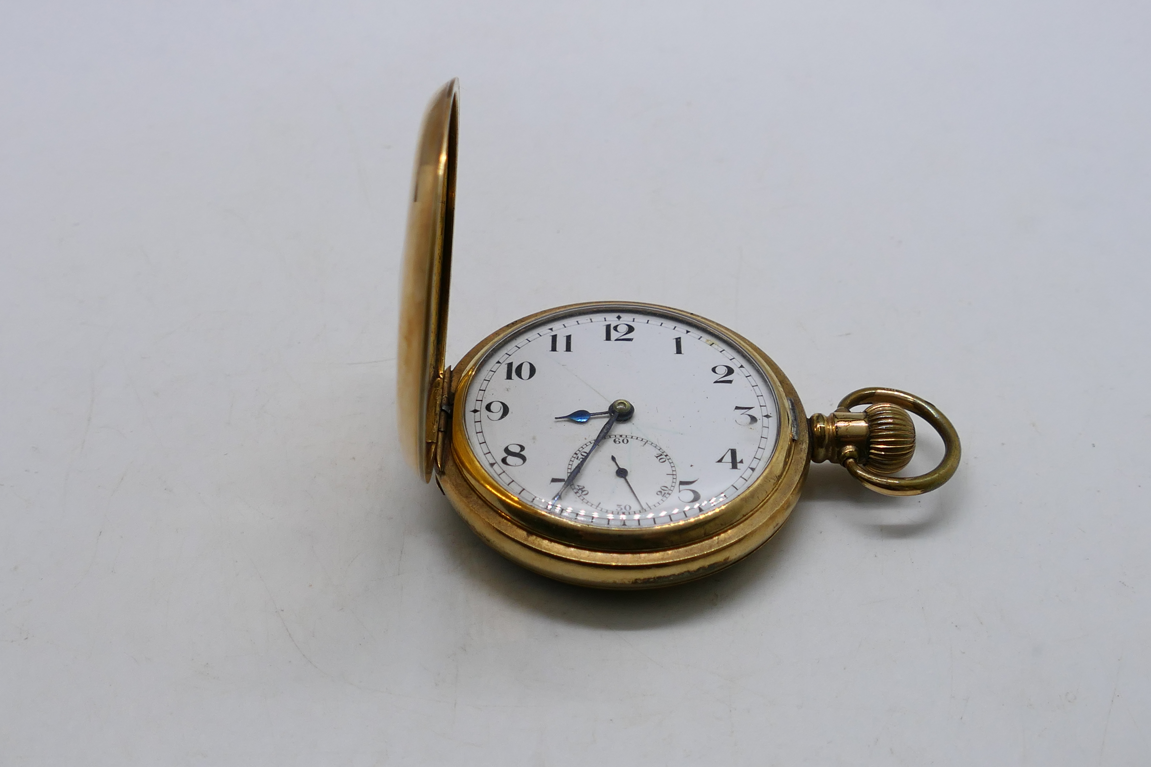 A gold plated half hunter pocket watch, Roman numerals to a white enamel dial, - Image 6 of 9