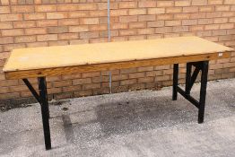 A military folding table, approximately 72 cm x 180 cm x 60.