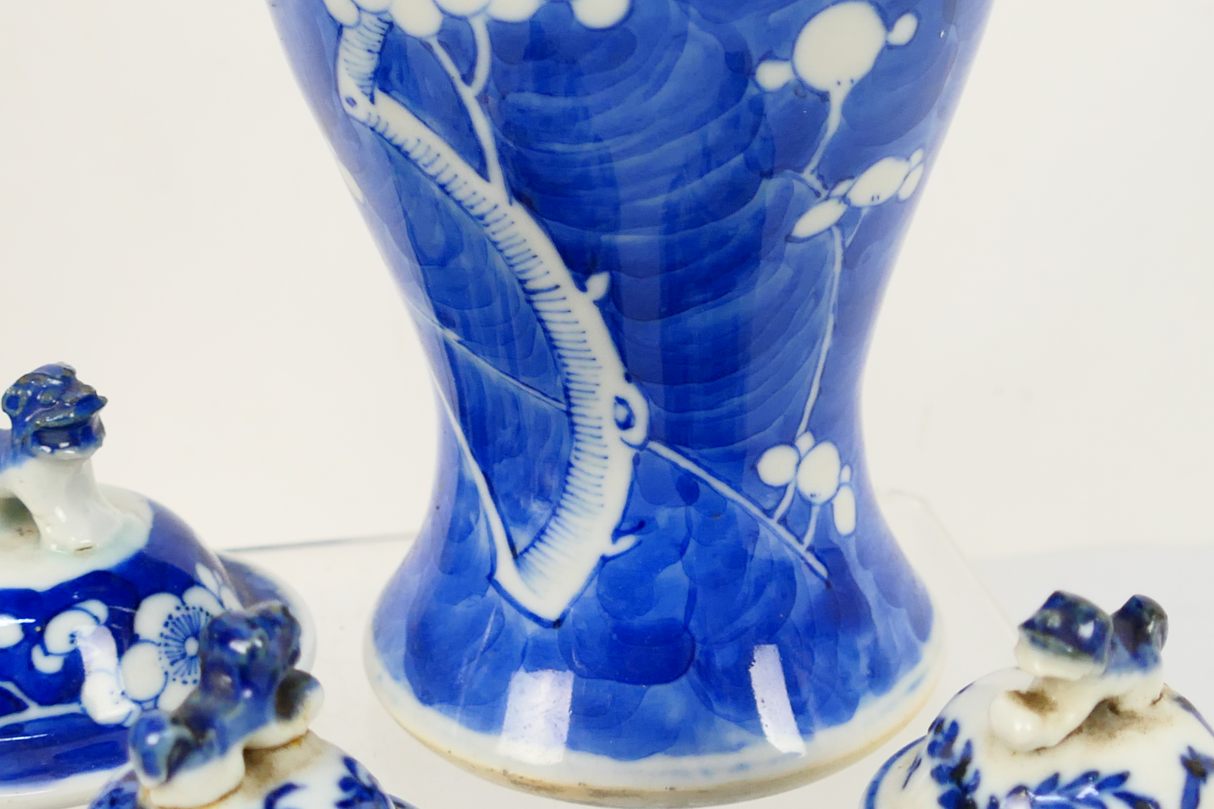 A group of 19th Century blue and white Chinese pottery covered vases of varying heights ranging - Image 10 of 36