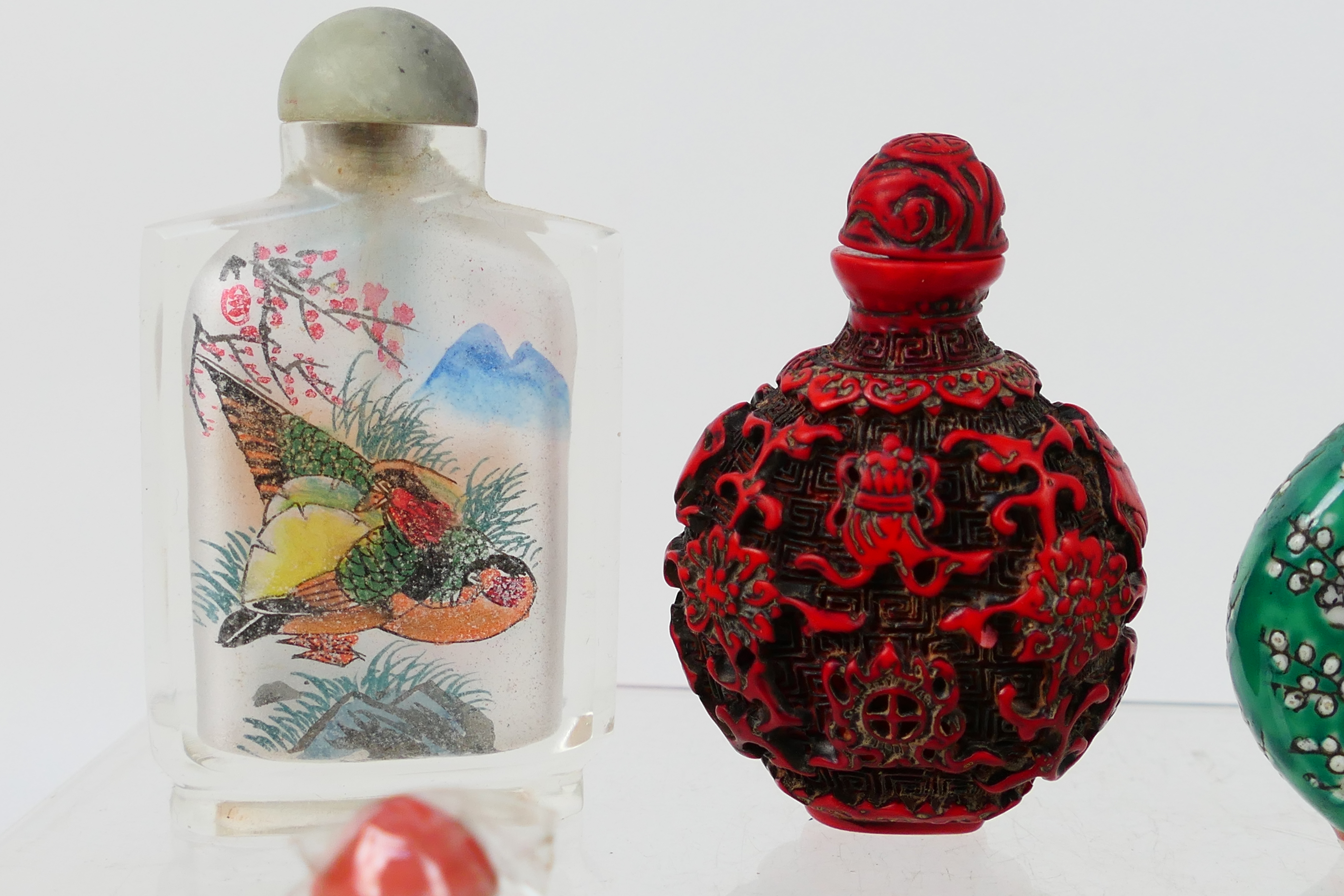 A collection of snuff bottles to include glass, ceramic and other. - Image 3 of 14