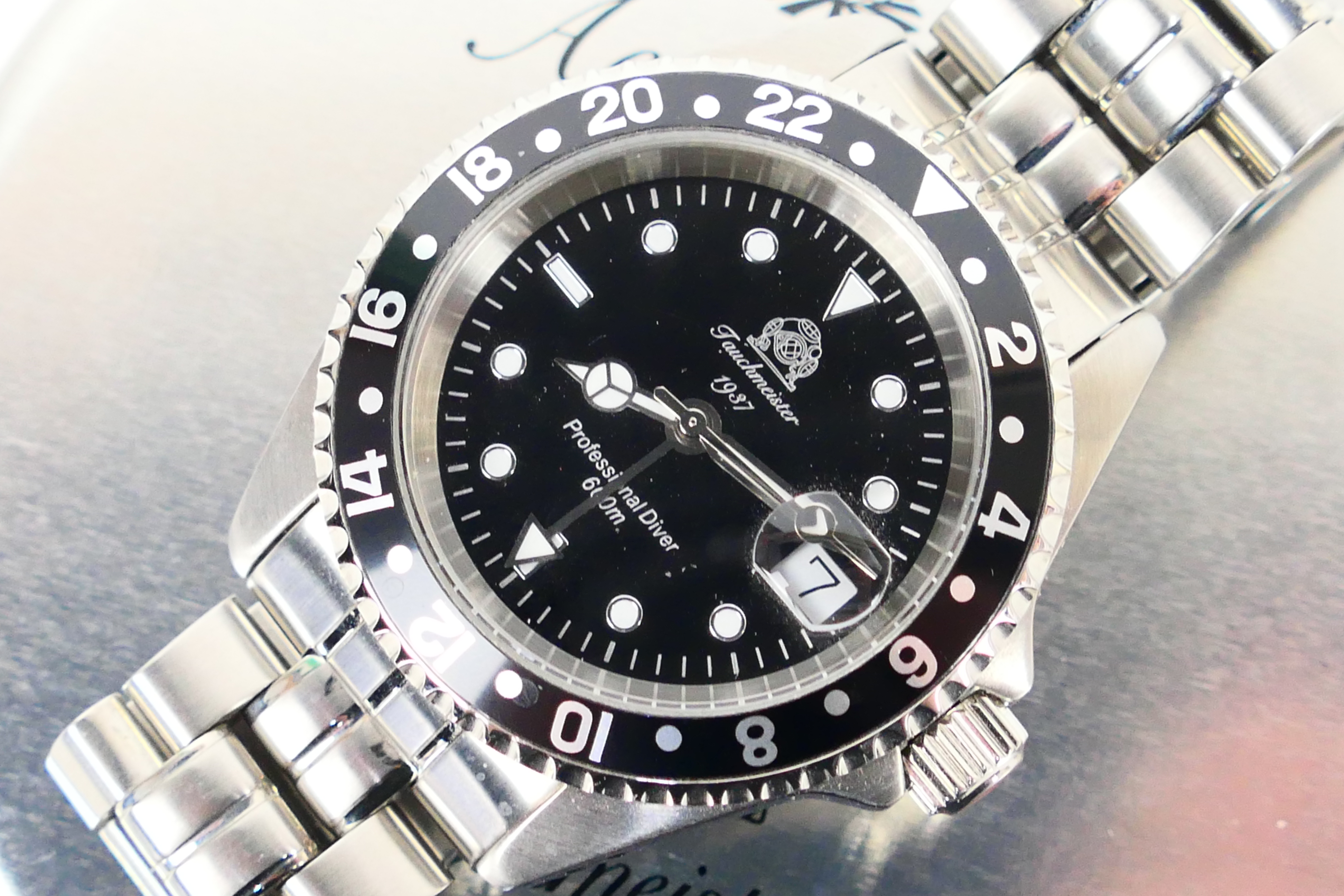 A Tauchmeister diver's wrist watch, black dial and bezel, on stainless steel bracelet, - Image 3 of 4