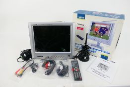 A Lloytron 10.4" LCD Portable Television with remote, with original box.