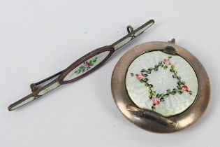 A small silver and enamel powder compact, 4.