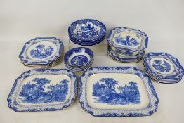 A collection of blue and white dinner wares, in excess of 30 pieces.