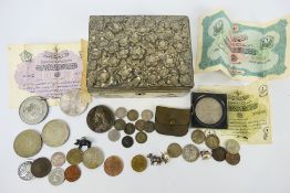 A small white metal lidded chest containing a quantity of UK pre decimal coins to include a