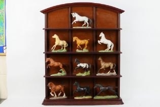 Ten Franklin Mint equine studies from the Great Horses Of The World collection with wooden display