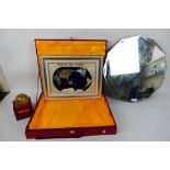 A boxed gemstone terrestrial globe paperweight, a similar wall map, also boxed and a wall mirror.