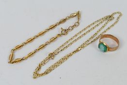 A small quantity of 9 carat gold comprising a cameo ring, a bracelet and a fine chain,