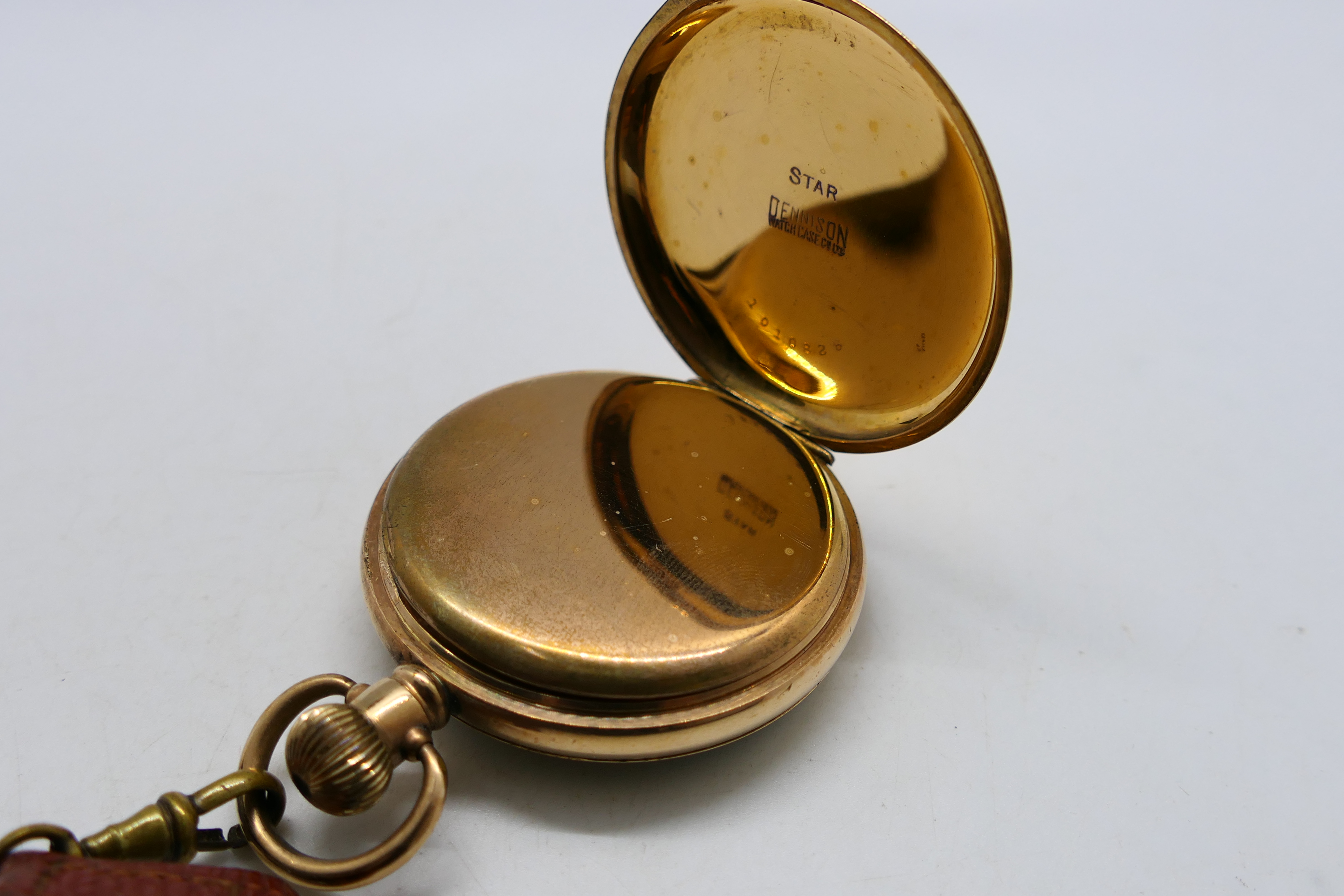 A gold plated open face pocket watch, Arabic numerals to a white enamel dial, - Image 5 of 8