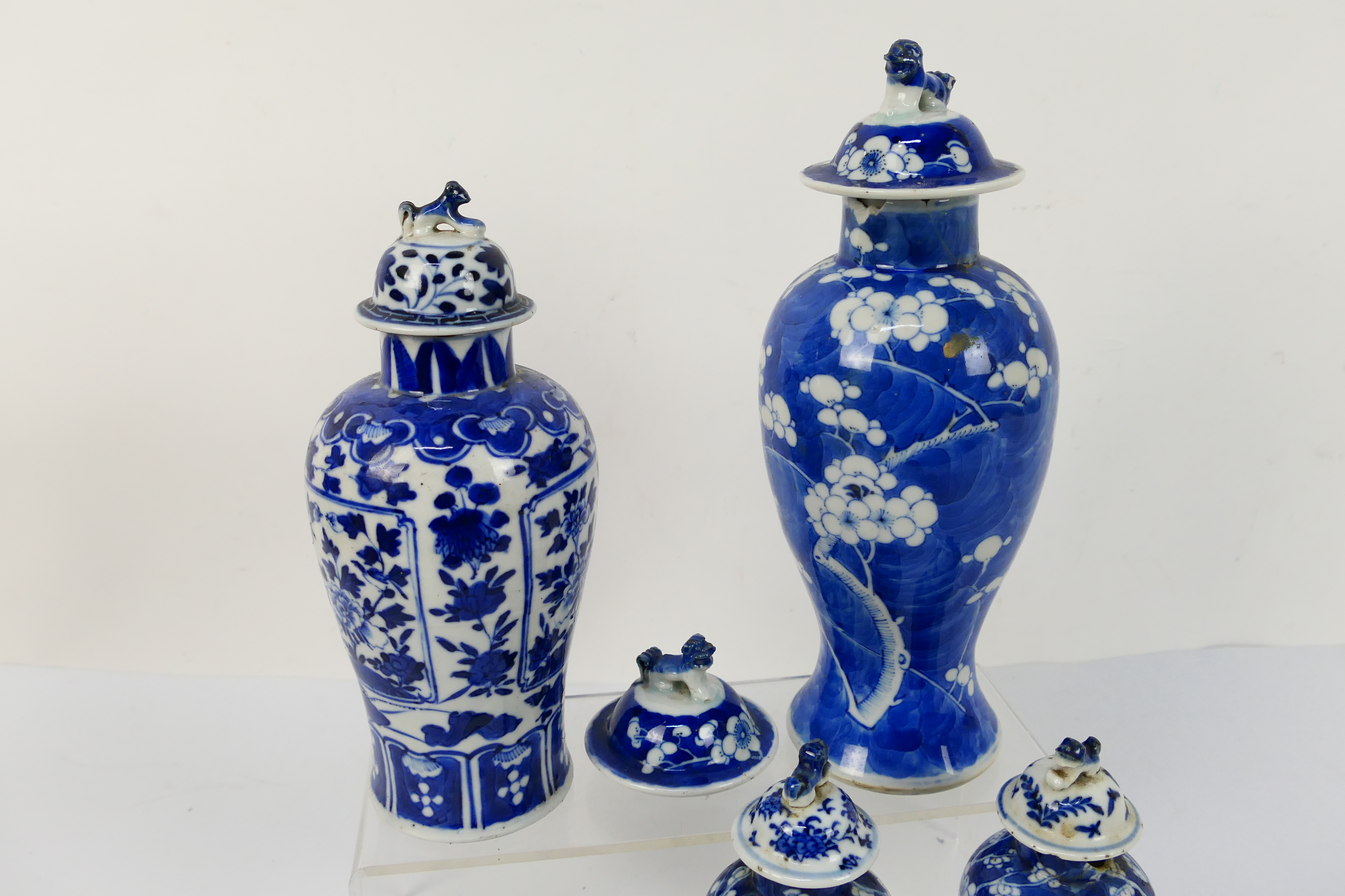 A group of 19th Century blue and white Chinese pottery covered vases of varying heights ranging - Image 2 of 36