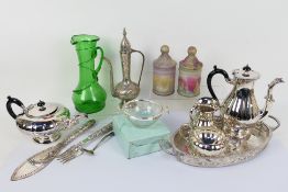 A collection of plated ware and glassware.